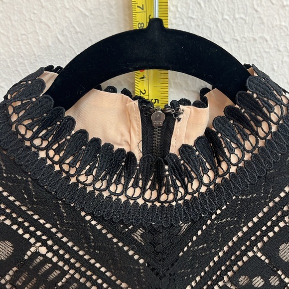 Black netted lace dress with tan lining the whole dress. - Picture 4 of 7